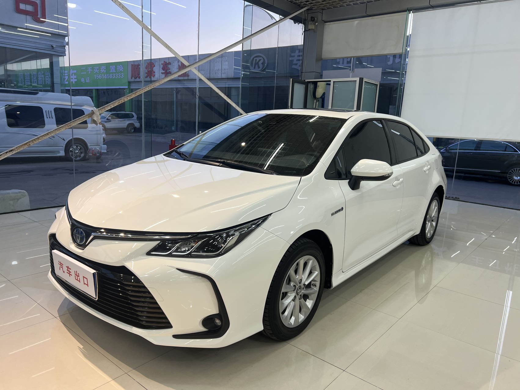 Toyota Corolla 2021 модельного года, гибридная 1.8L E-CVT, версия Elite